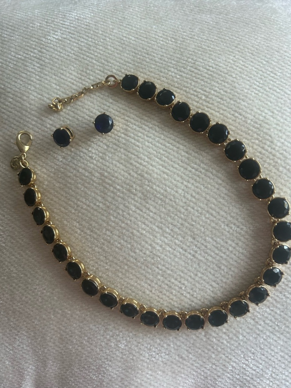 Gold Tennis Necklace and Stud Earrings with dark blue sapphire costume jewelry.